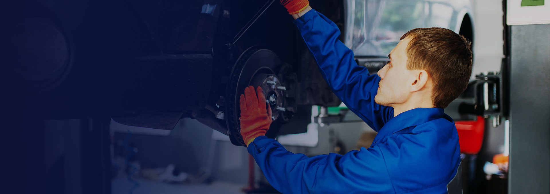 using-car-jack-to-replace-tyre-with-puncture-quickly-for-customer-in-London.jpg